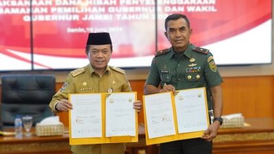 Gubernur Al Haris Serahkan Dana Hibah Pengamanan Pilkada 5.8 Miliar Pada Korem 042 Gapu