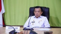 Gubernur Al Haris Ikuti Rakor Persiapan PSU Melalui Zoom Meeting